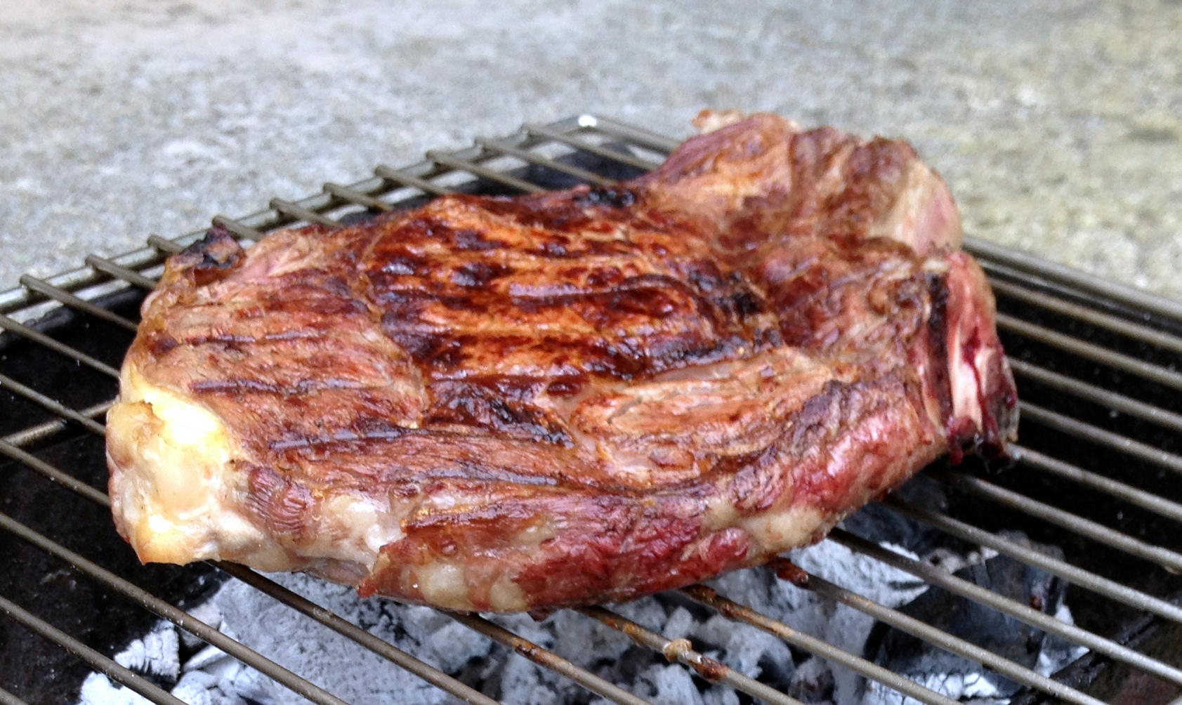 Cote de boeuf, a bone-in rib steak grilled for sharing
