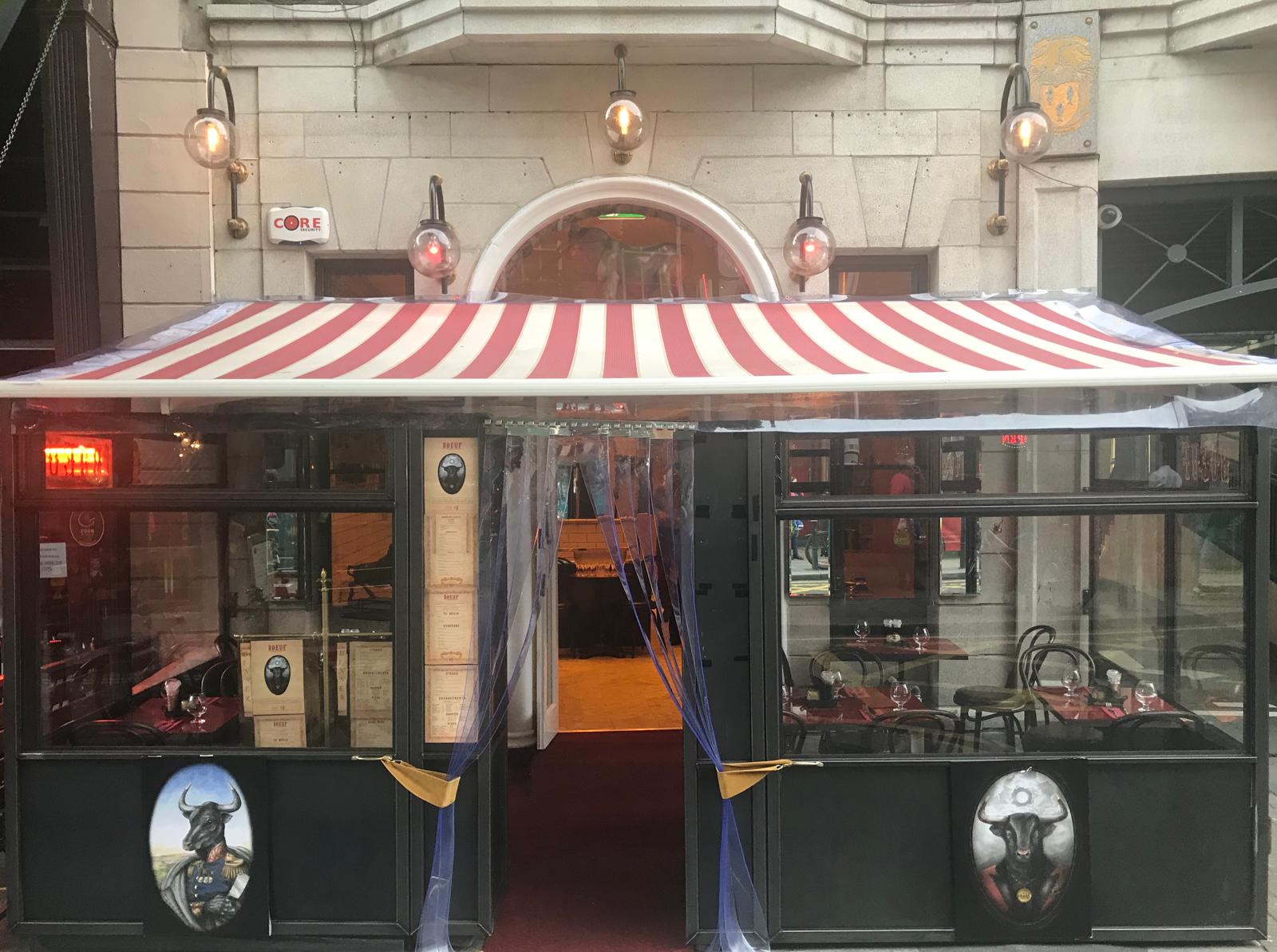 Boeuf South William Street shopfront with red-and-white striped awning