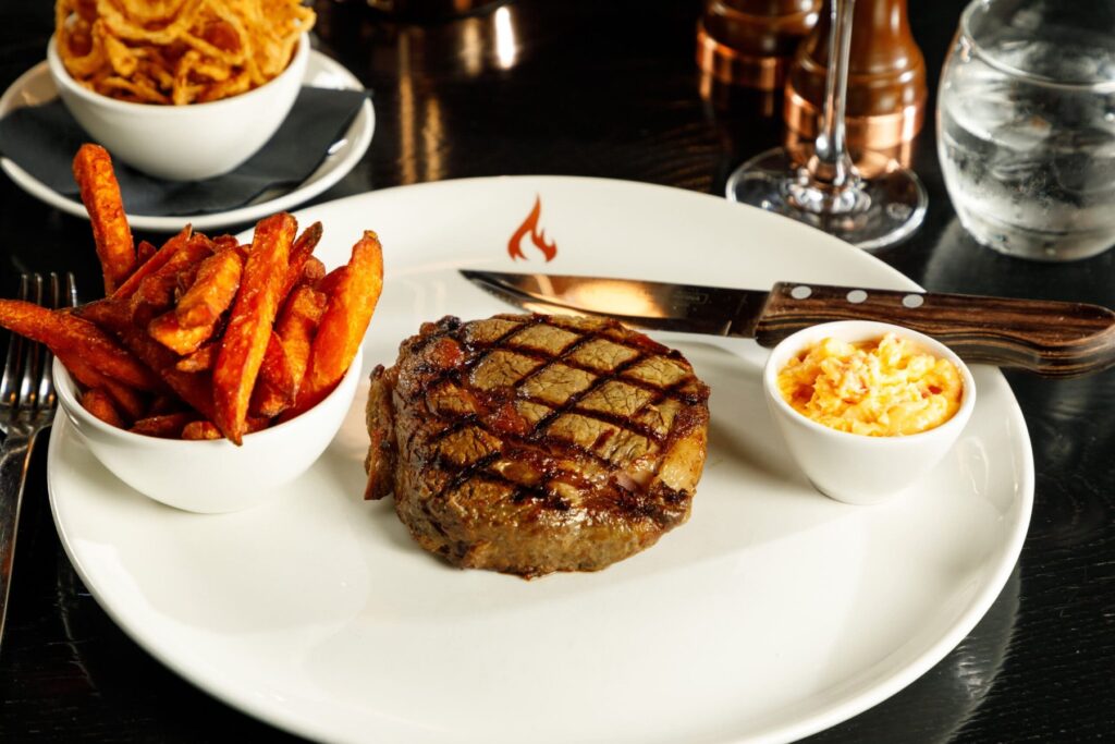 Chargrilled centre-cut fillet steak with sweet potato fries at FIRE Steakhouse & Bar